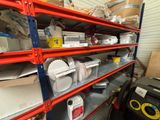 many shelves with various items on them in a room