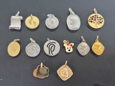 a close up of a bunch of charms on a table
