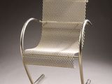 an image of a rocking chair with a woven seat on a grey background