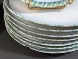 several plates stacked on top of each other on a table