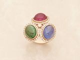an image of a gold ring with multi colored stones and diamonds