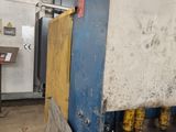 a large machine that is sitting in a factory