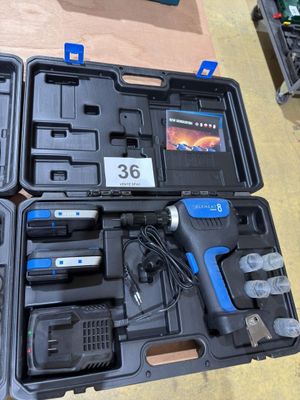 a box with tools in it sitting on a table