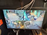 a monitor that has a picture of a man on it