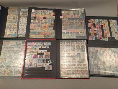 a lot of different stamps on the pages of a binder