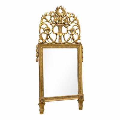 an ornate gold mirror with a white background and a white background