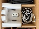 a cardboard box with a bunch of wires and wires in it