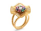 une image d'une bague en or ornée de pierres multicolores