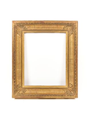 a gold frame with a decorative pattern and a white background