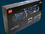 a box with a model of a race car inside of it