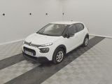the white citrole is parked in the garage on the checkered floor