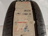 a close up of a car tire with a sticker on it