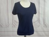 navy blue short sleeved t - shirt on a mannequin base