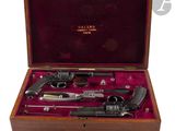 an old gun in a wooden case with a red velvet lining