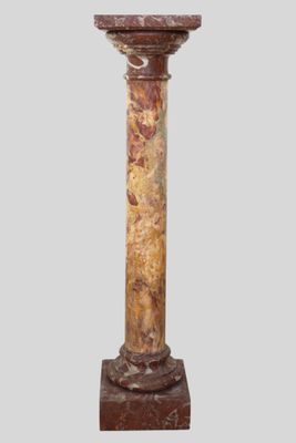 an image of a marble pedestal with a clock on top