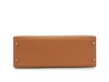 the long wallet in tan leather with gold hardware