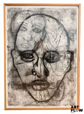 l'image d'un dessin d'un visage d'homme sur une feuille de papier