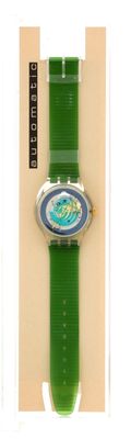 La montre est verte et présente un motif bleu et blanc.