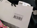 a label on the back of a jacket that says dolce