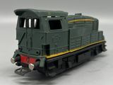 a toy train that is sitting on a white surface