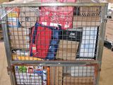 a large metal cage with a bunch of items inside of it