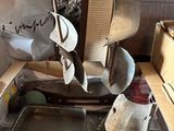 a cardboard box with various items on top of it