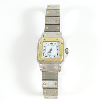 an image of a silver and gold wrist watch with roman numerals