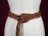 brown leather belt with fringes on a mannequin mannequin mannequin mannequin mannequin mannequin mannequin mannequin