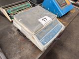 a stack of electronic equipment sitting on a table