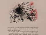 an open book with a black and red drawing on it