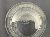 a glass bowl with a picture of a person in it
