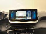 the dashboard of a car with a digital display in the center