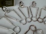 a lot of surgical instruments that are on the table