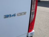a close up of the rear end of a white truck