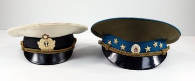 two hats sitting on top of each other on a table