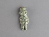 une image représentant une figurine en pierre représentant un chien