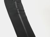 black pants with a black stripe on the side and a white background
