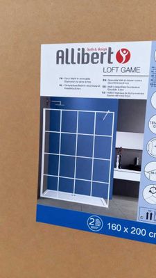 a cardboard box with a picture of a bathroom with blue walls