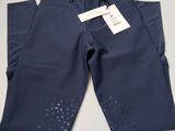 a close up of a pair of blue pants with a tag on it