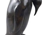 statue of a penguin on a white background with a white background
