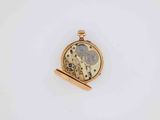 an image of a gold pocket watch on a white surface