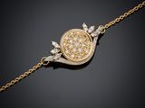 un bracelet en or jaune et diamants