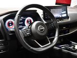 steering wheel and dashboard of a car with a digital display