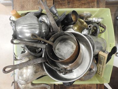 many pots and pans that are sitting on a table