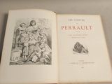 an open book with a picture of a woman and two children
