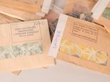 a pile of old envelopes sitting on top of a table