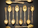 a lot of spoons and spoon spoons on a table
