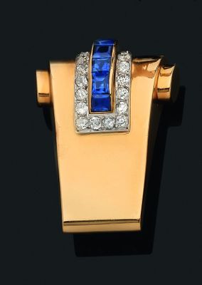 une photo en gros plan d'une bague en diamant bleue et blanche