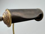 a lamp that is sitting on a table with a cord