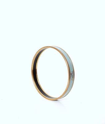 an image of a close up of a ring on a white surface
